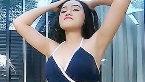 Asian teen 18+ In Black Bikini